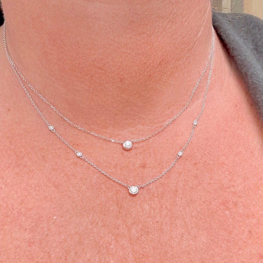 White Gold Diamond Station Necklace 1/4 tcw 
Bezel Set Diamond Solitaire